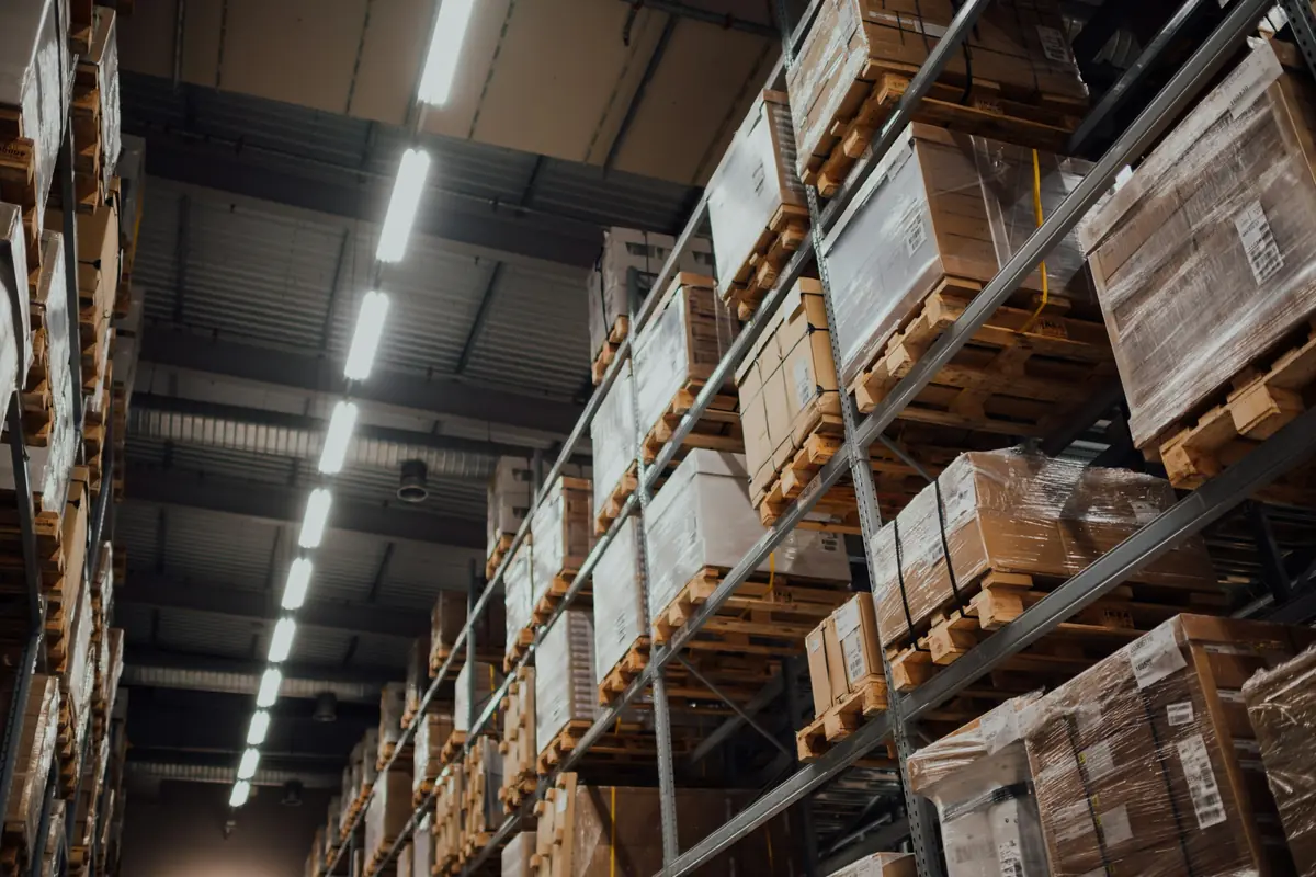 Racking in a distribution warehouse stacked with palletised goods